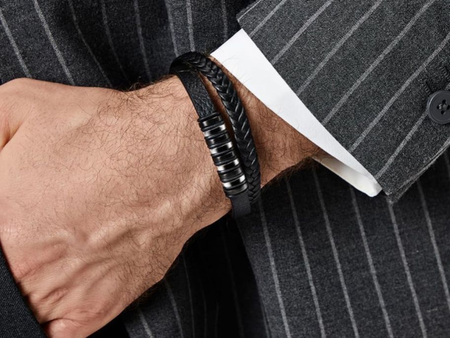 A man wearing a Lucky2+7 Mens Leather Bracelet