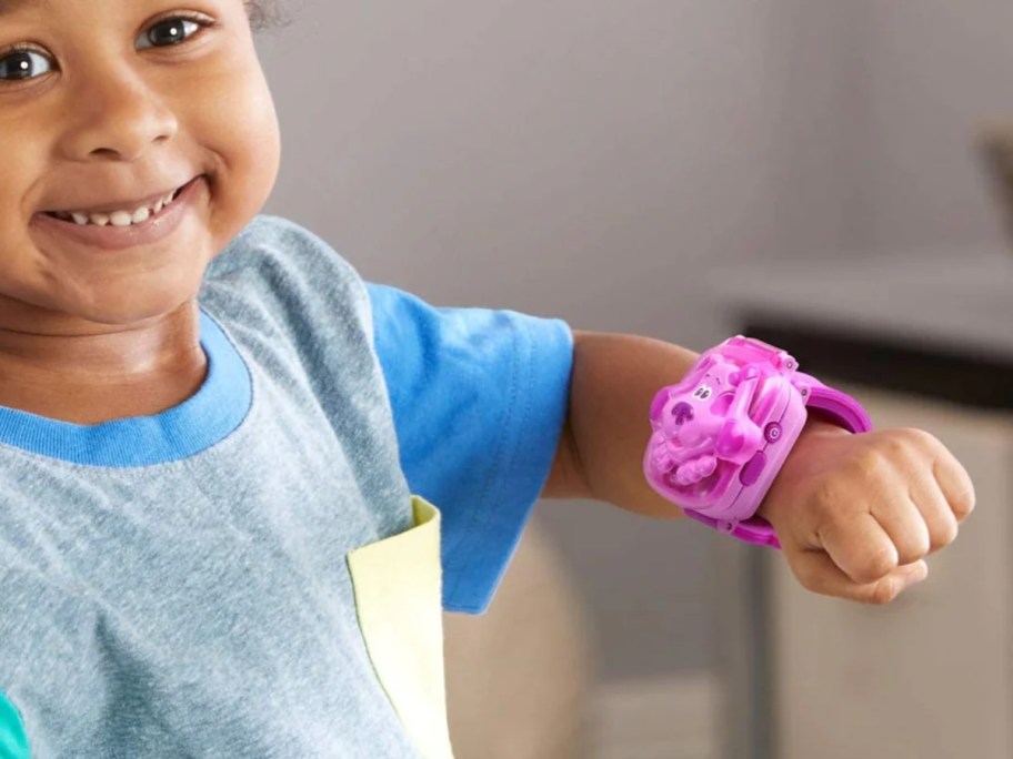 toddler wearing LeapFrog Blue's Clues & You! Magenta Learning Watch