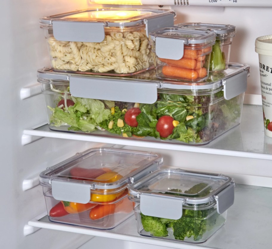 Mainstays Tritan Food Storage 18-Piece Set sitting on fridge shelves filled with food