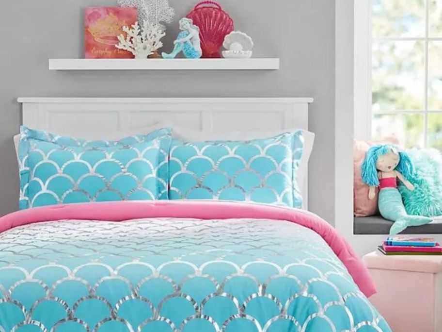 A member's Mark Mermaid theme comforter set on a bed