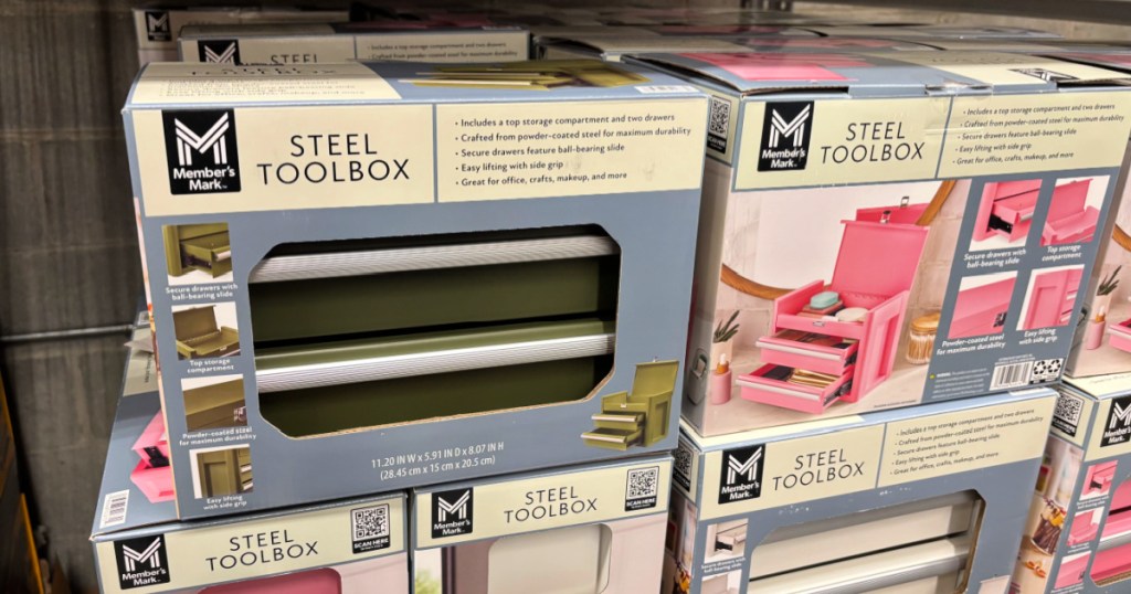 Green and pink mini steel toolboxes on display inside Sam's Club warehouse