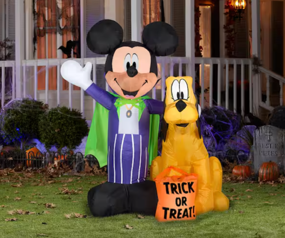 A mickey mouse and pluto inflatable halloween decoration from home depot