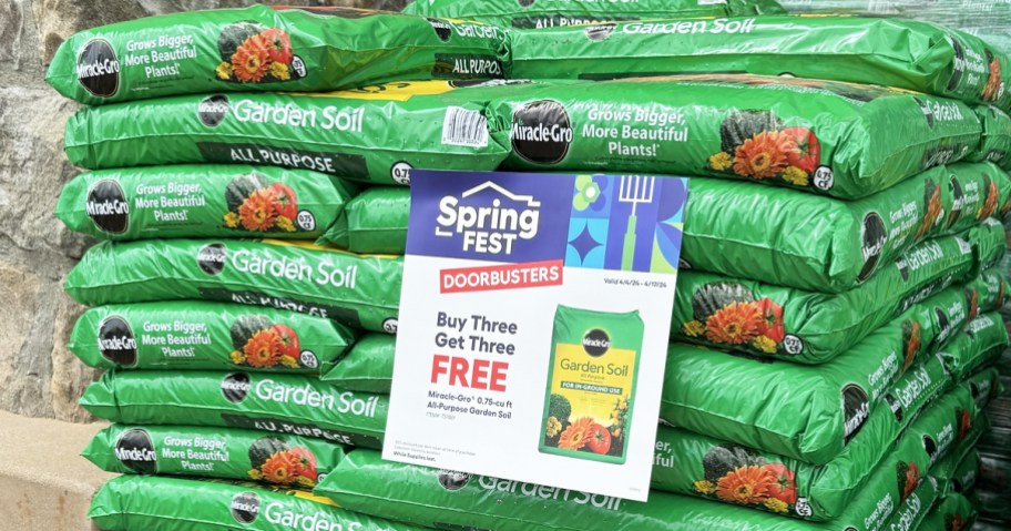 Miracle-Gro In-Ground Use All-Purpose Garden Soil bags with buy 3 get 3 free sale sign