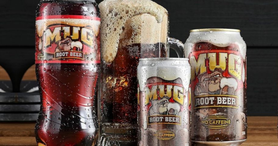 Mug Rootbeer products next to a frothy glass mug of rootbeer