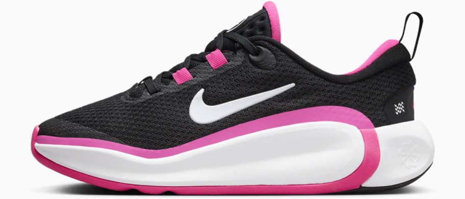 black, white, and pink nike running shoe