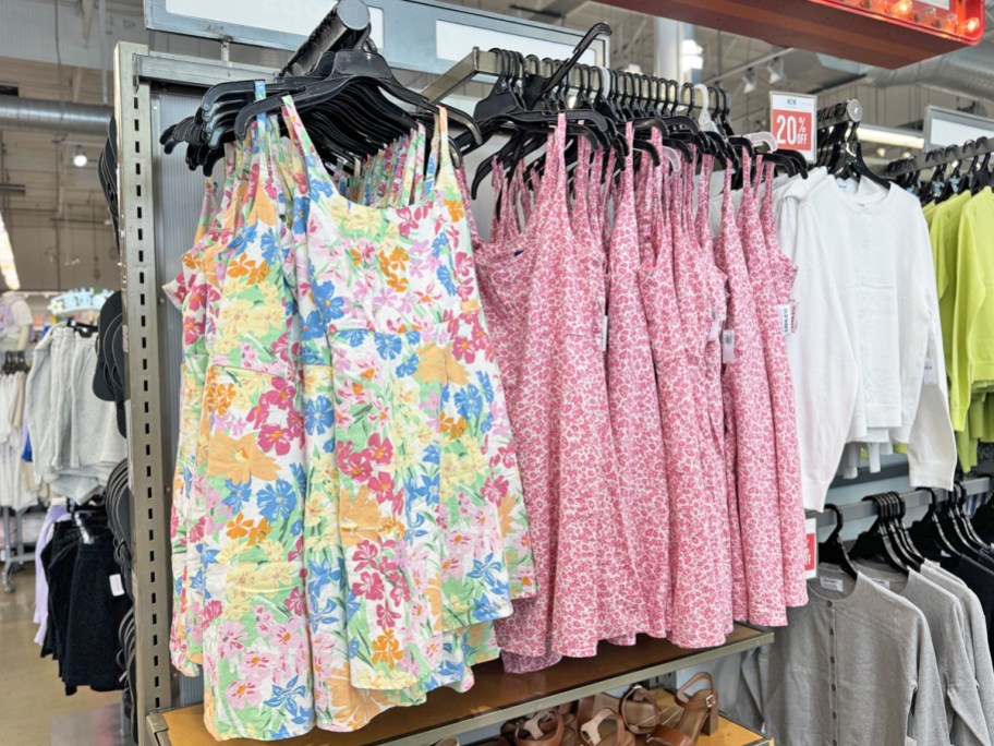 rack of floral print dresses in Old Navy store