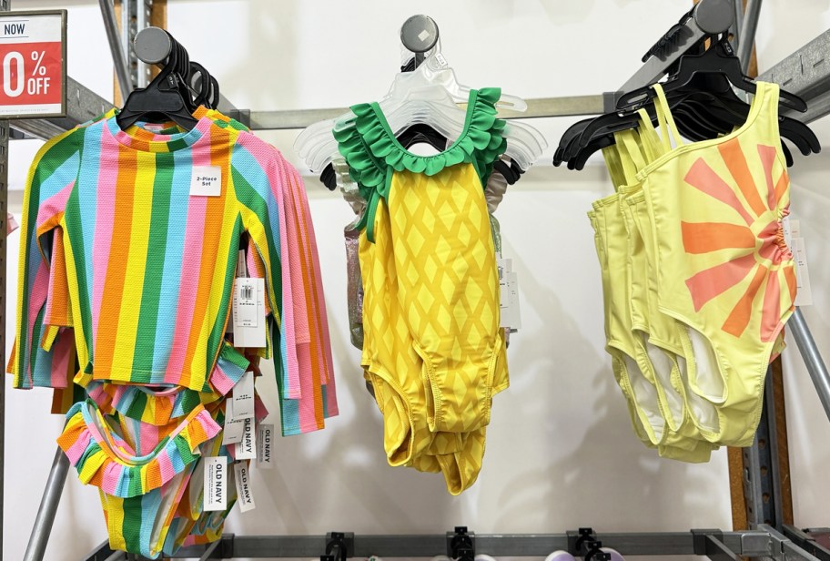 Toddler Girl Swimsuits hanging up at Old Navy