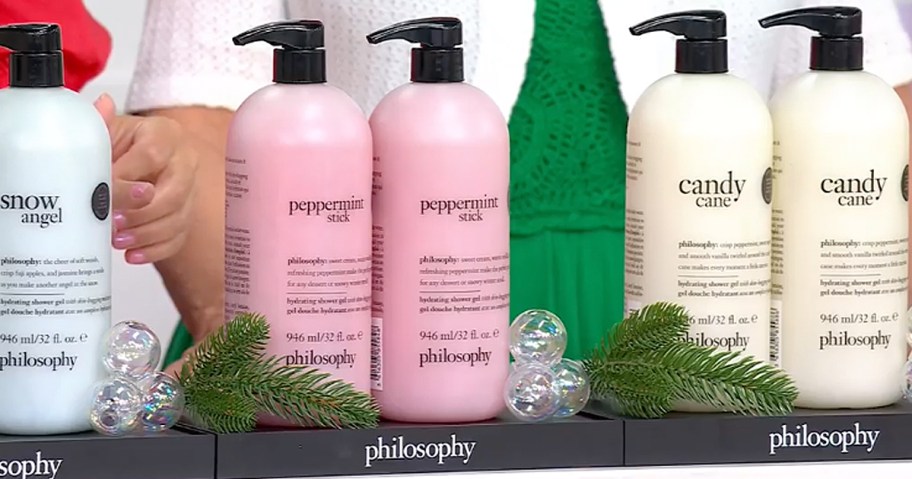 large philosophy shower gel bottles with pump tops on display