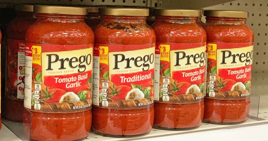 row of prego pasta sauces on store shelf