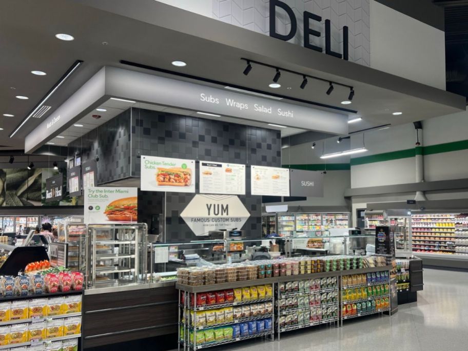 The Publix Deli sub station with chips and drinks in front of it