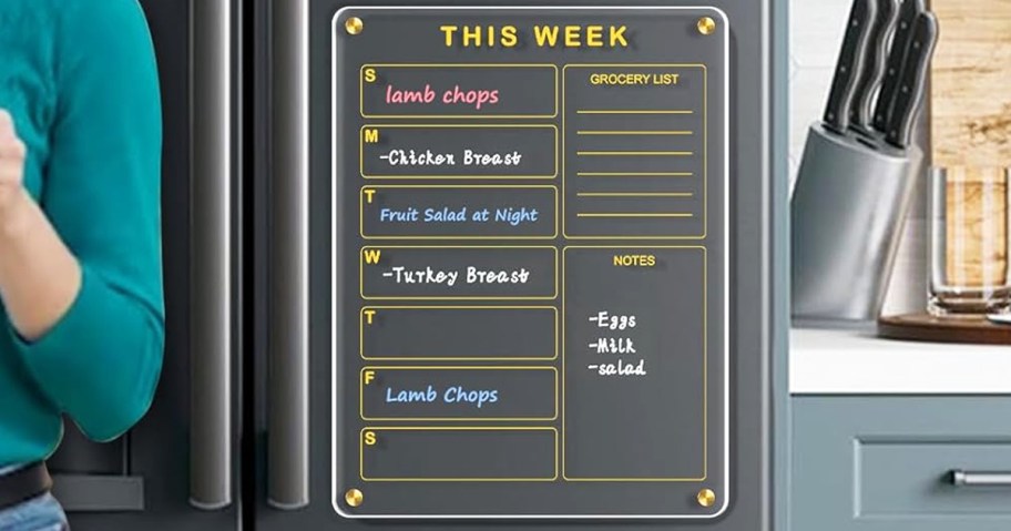 weekly planner on black fridge