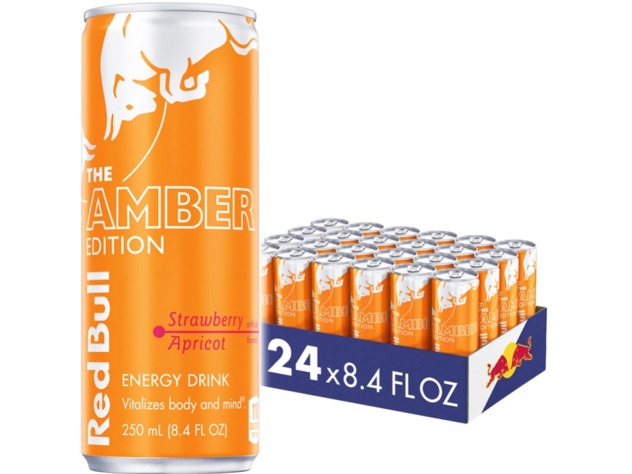 orange case of Red Bull Amber Edition Strawberry Apricot Energy Drinks with large can in front of it