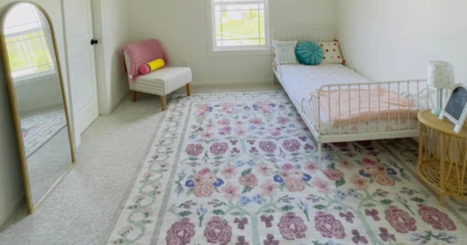 floral print area rug in bedroom