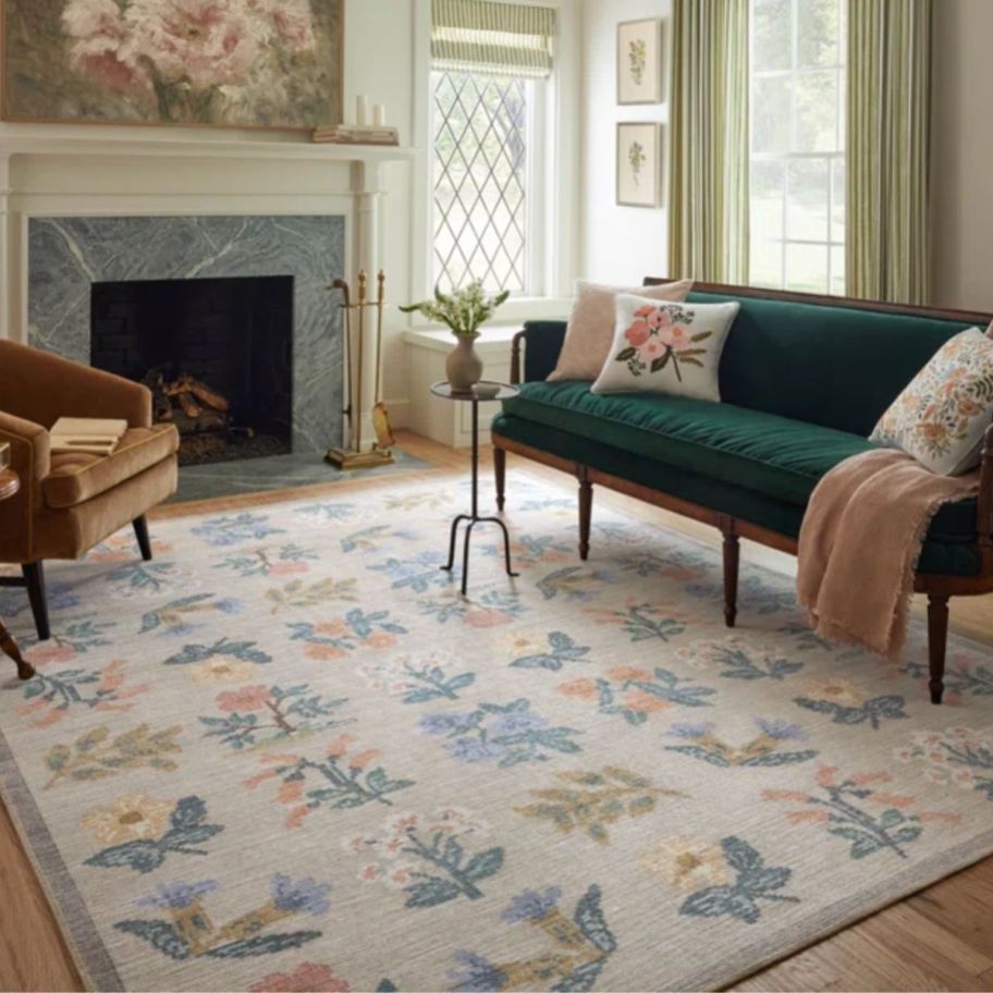 a floral rug in a traditional styled living room