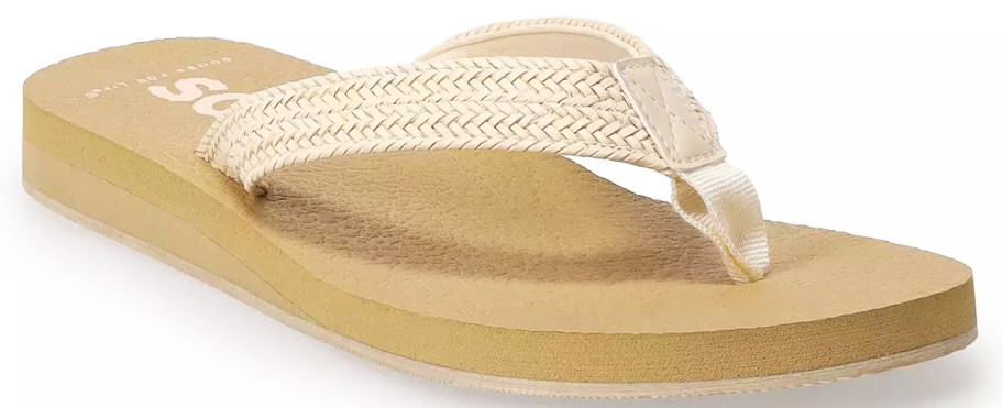 tan sandal with white woven straps
