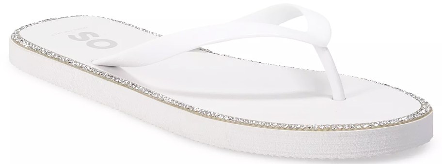 white flip flop with rhinestones along the sides
