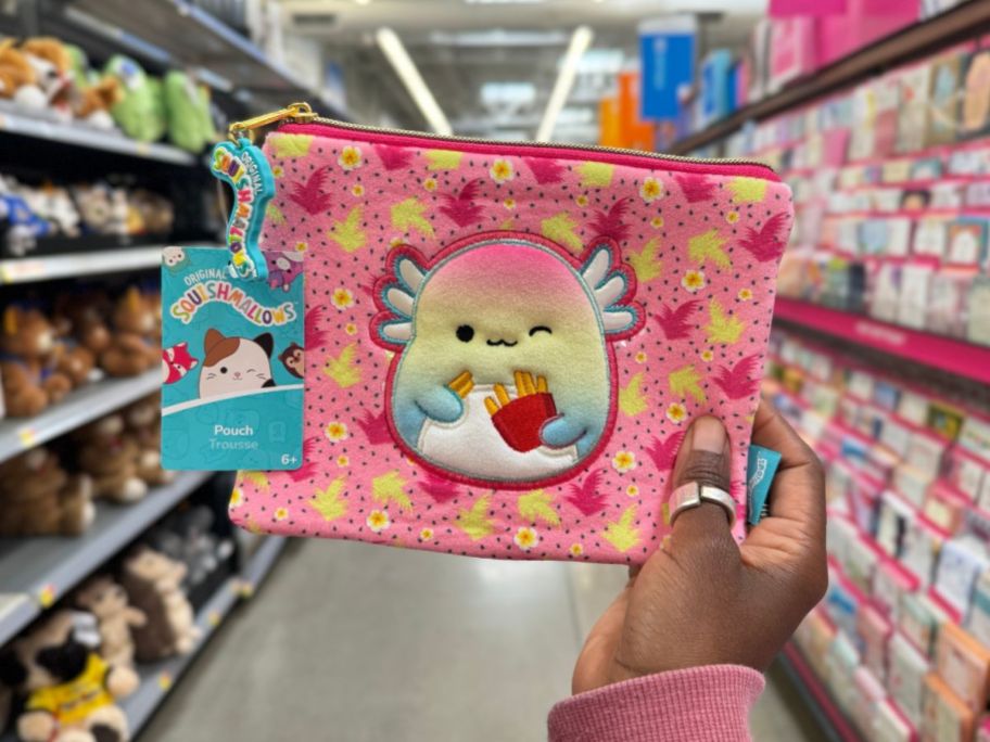 A hand holding a Squishmallows Pencil Pouch