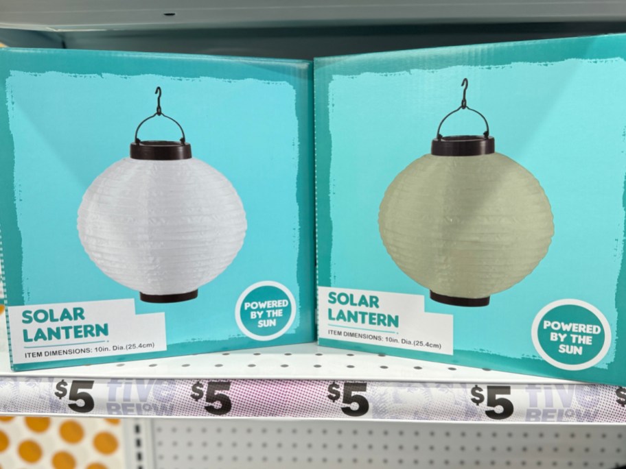 Store display of solar lantern with $5 price underneath