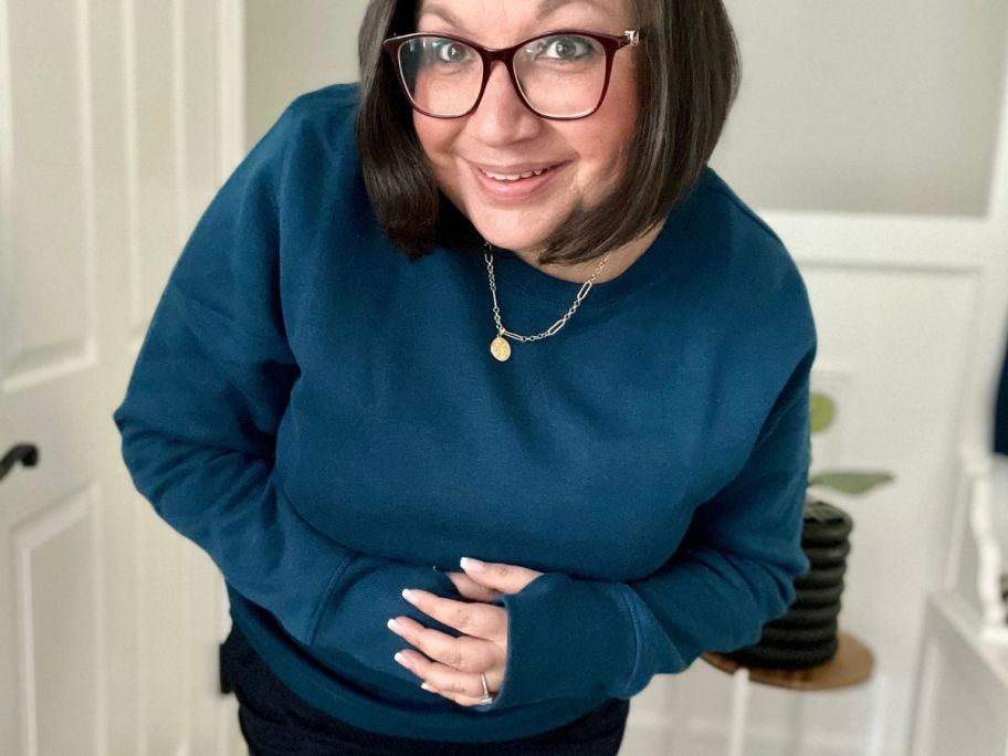 woman wearing a Tek gear sweatshirt