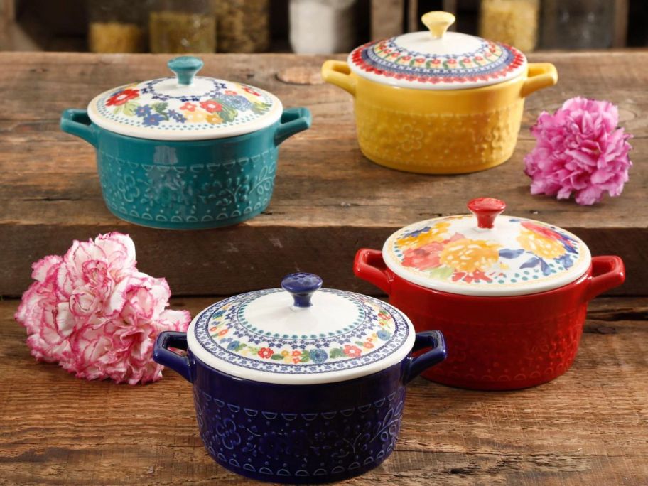The Pioneer Woman Set of 4 Floral 13-Ounce Assorted Color Casseroles w/ Lids on table
