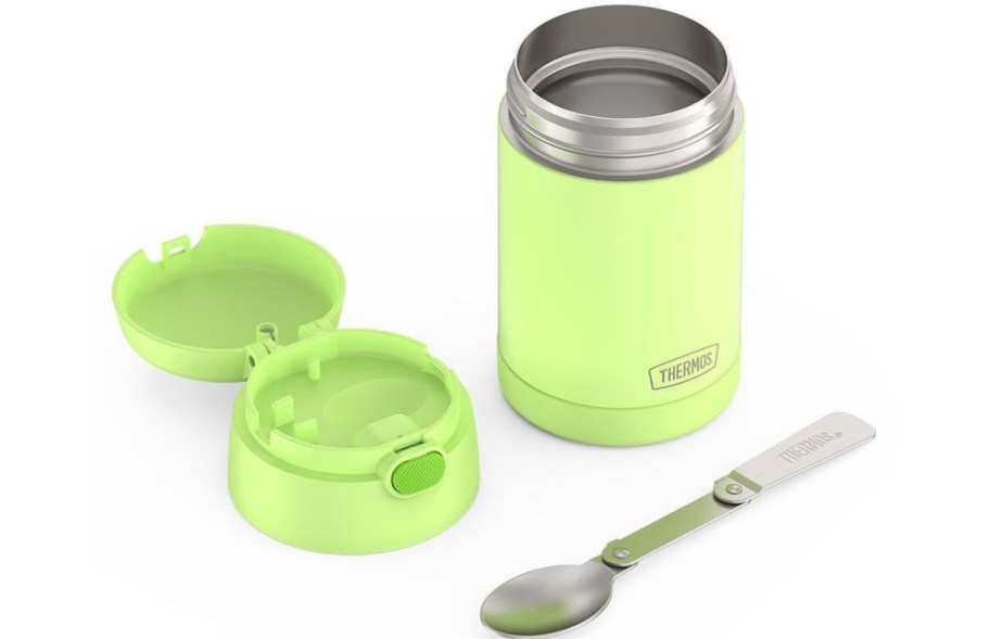 Thermos with spoon next to it