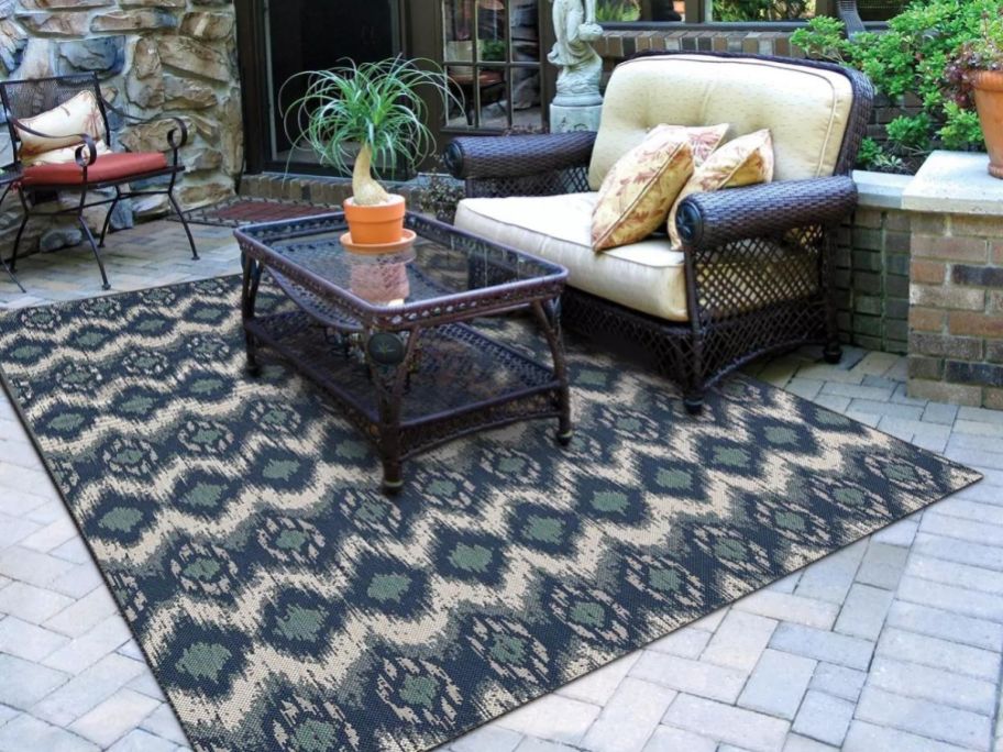 Threshold Ikat Outdoor Rug Blue on a patio