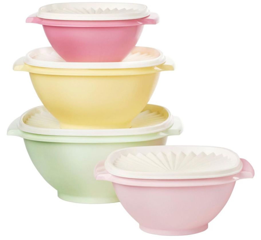 an 8 piece set of pastel colored tupperware bowls