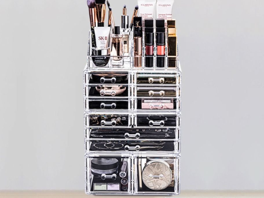 Stock image of URMOMS makeup organizer filled with cosmetics