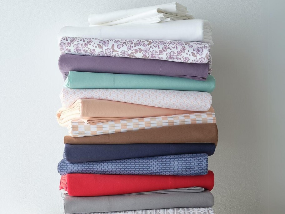folded sets of sheets in different solid colors and prints