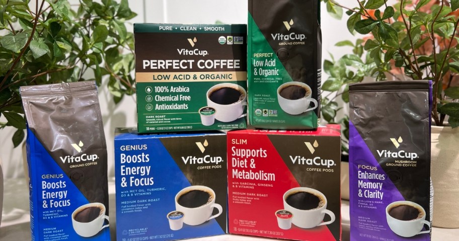 various VitaCup coffee - pods and ground coffee bags on a counter
