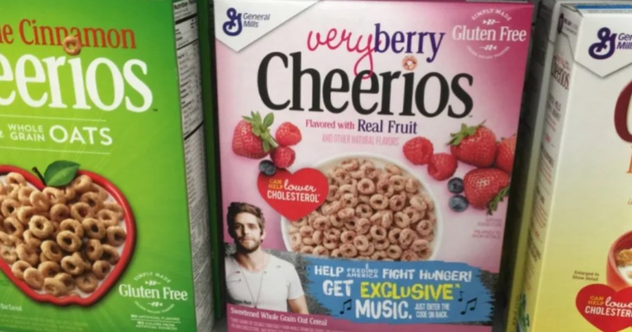 Very Berry Cheerios on a shelf in store with other Cheerios cereals.