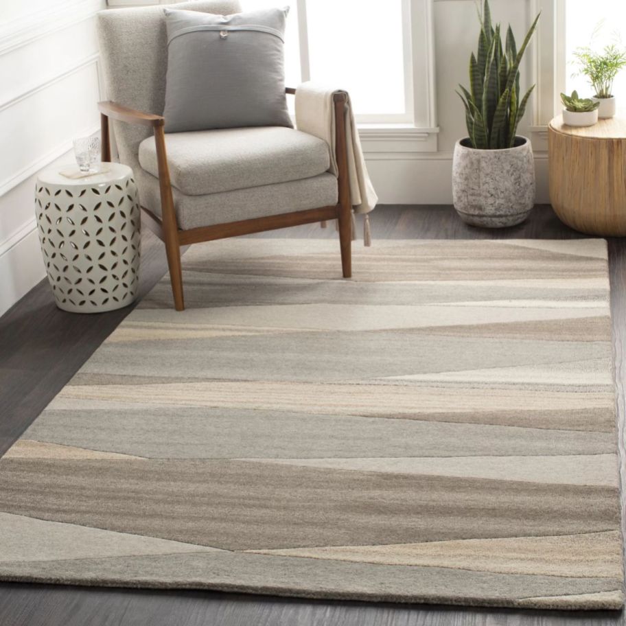 a wool abstract geometric rug in a living room