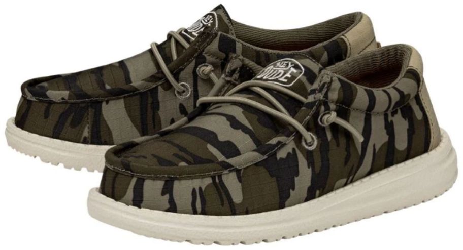 a pair of camo sneakers