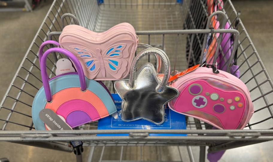 Walmart shopping cart with kids bags inside