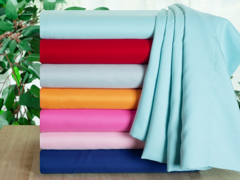 stack of colorful folded sheets