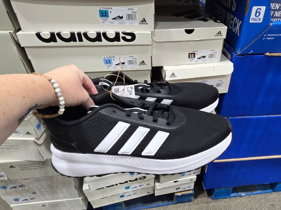 adidas Men's XPLR Path Sneaker in hand in store