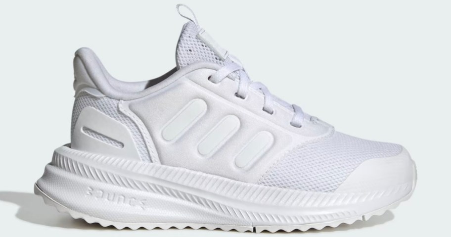 stock image of white adidas kids shoe