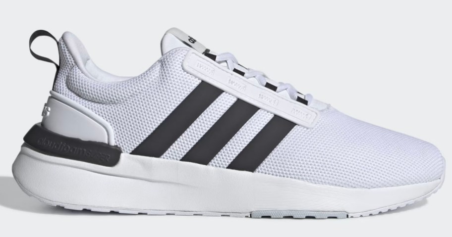 stock image of white and black adidas shoes