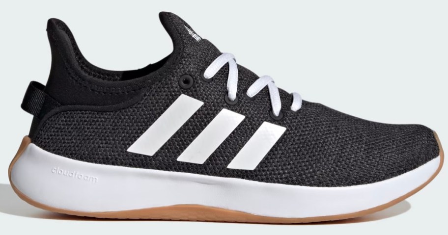 stock image of black and white adidas shoe