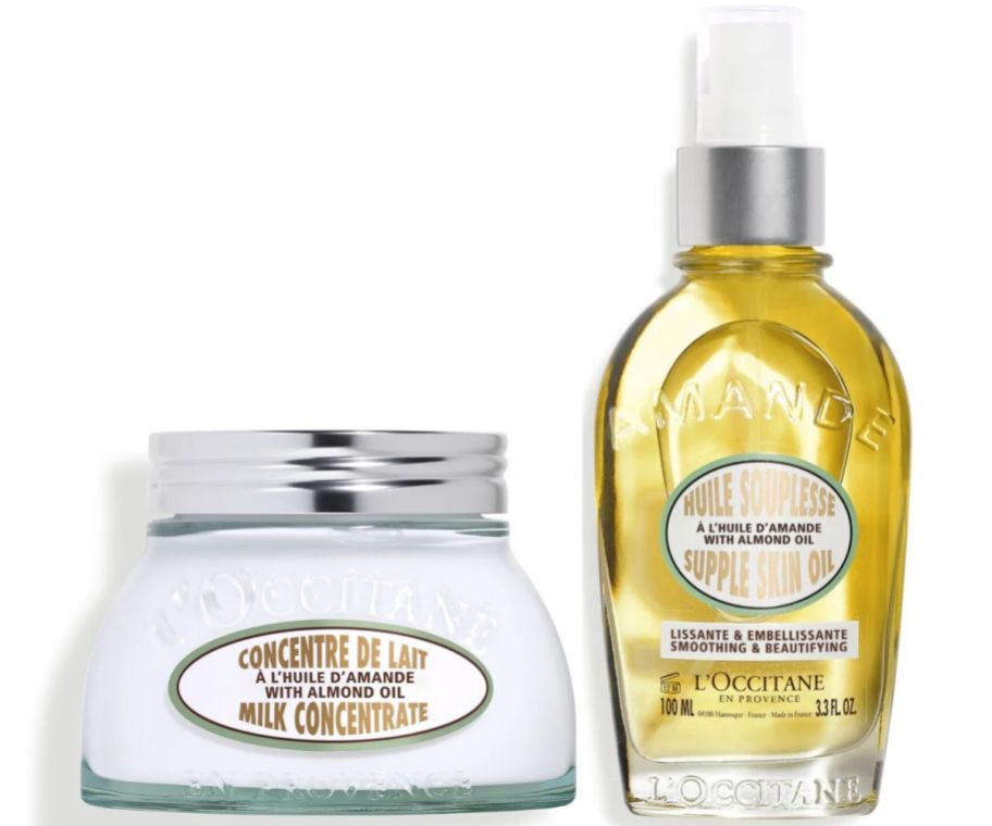 a jar of almond oil body cream and a bottle of almond body oil