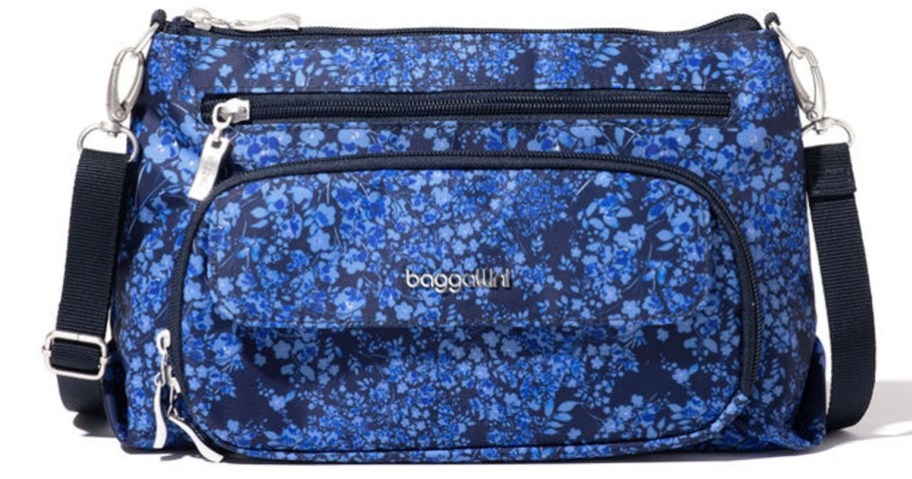 blue floral baggallini bag stock image