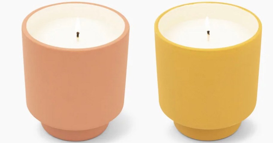 orange and yellow ceramic candle stock images