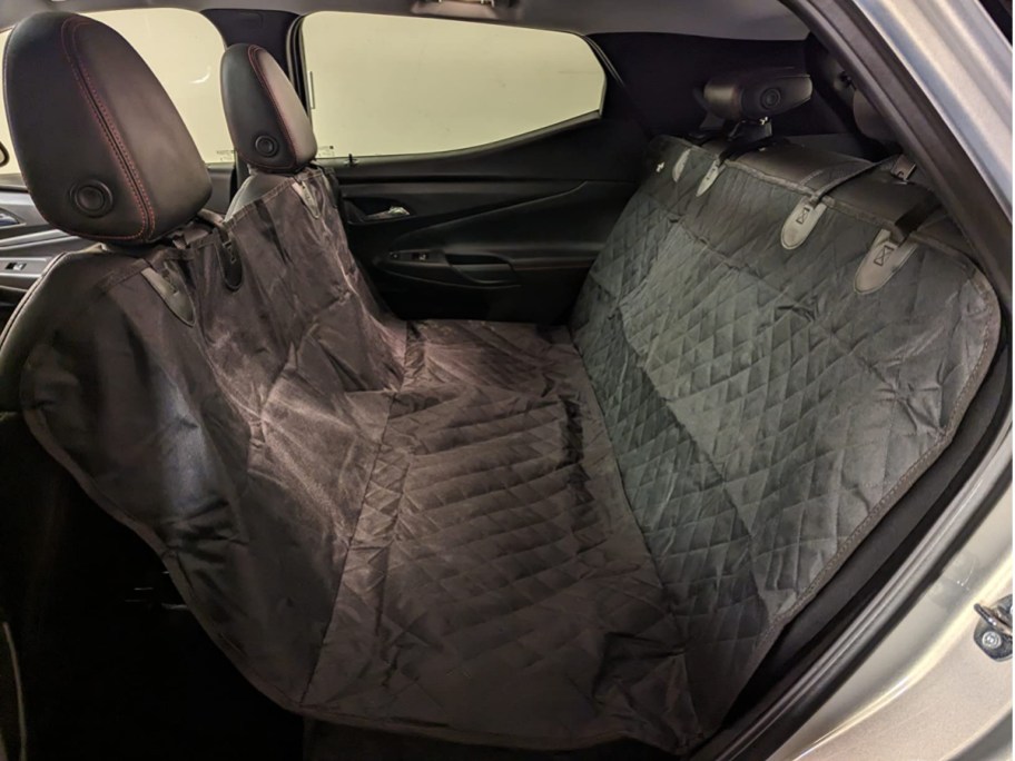 black pet car seat cover displayed in a car