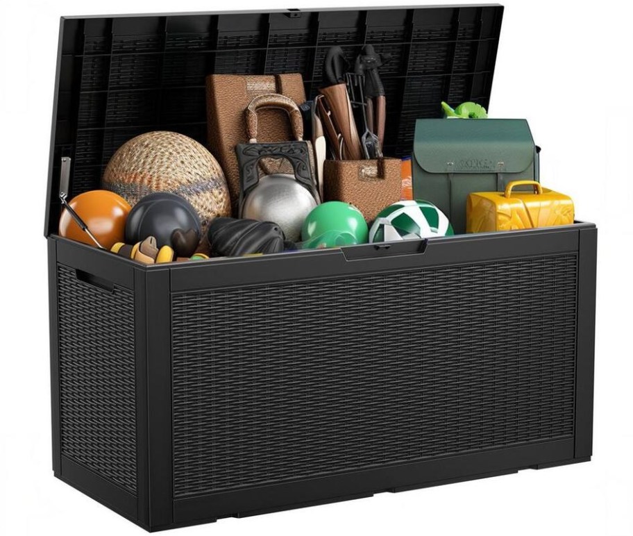 black wicker resin deck box 100 with open lid and sports balls, tools, and bags inside