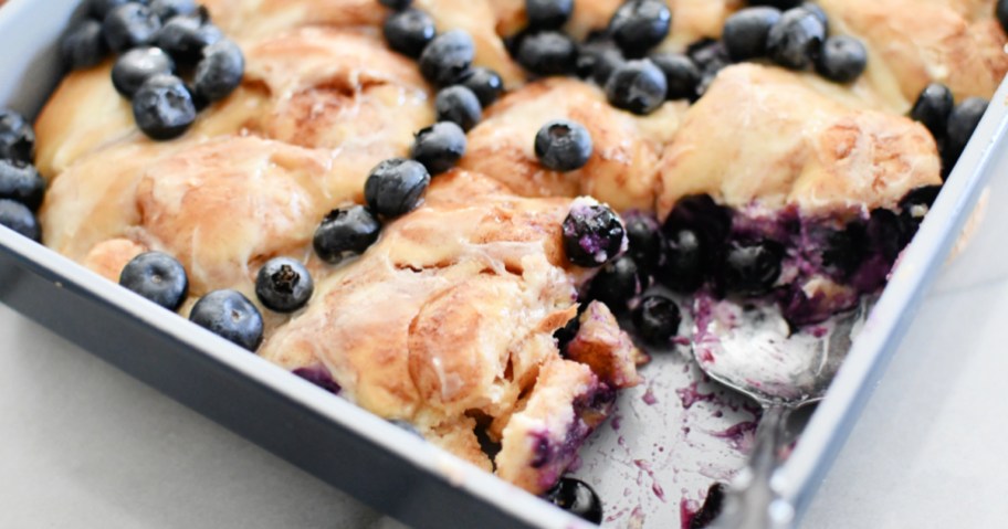 blueberry cinnamon roll bake in the pan