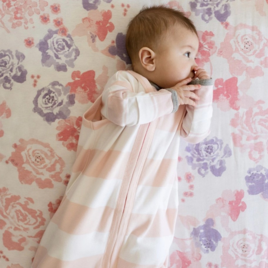baby girl in striped pink wearable blanket