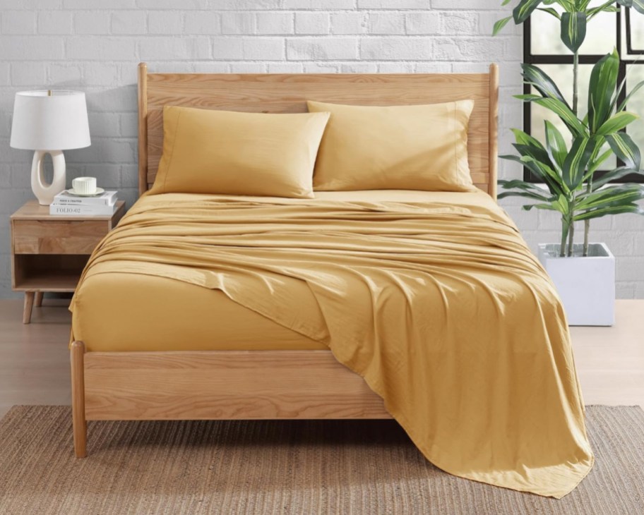 yellow sheets on bed