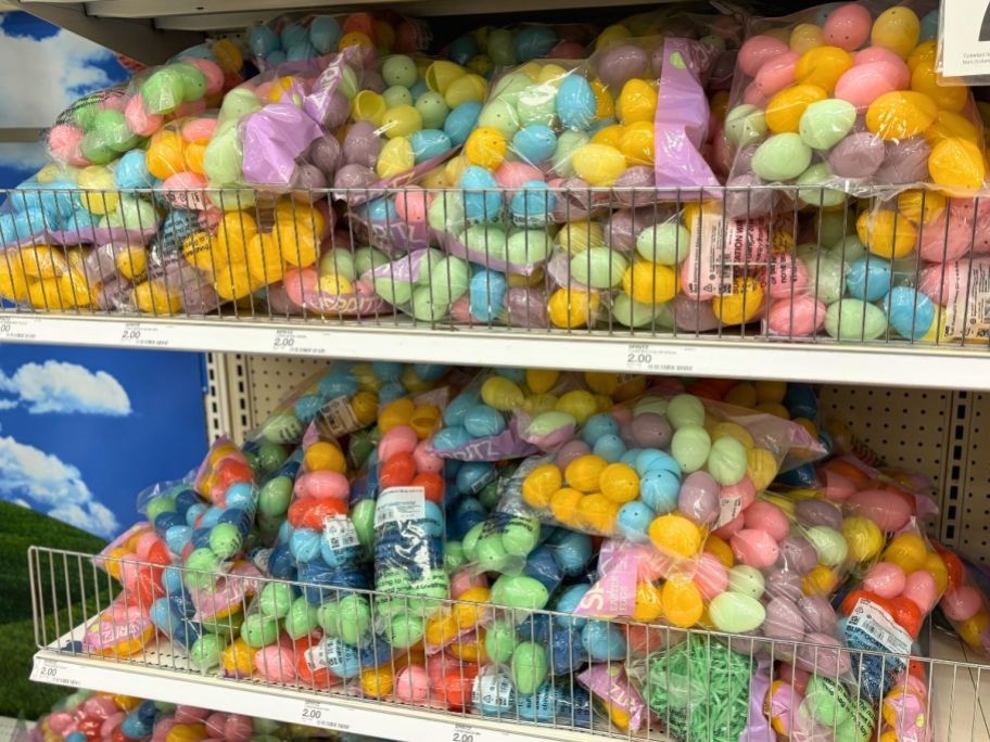multi colored plastic easter eggs on a store shelf