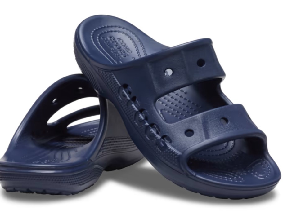 pair of Croc's adult slide sandals in navy blue