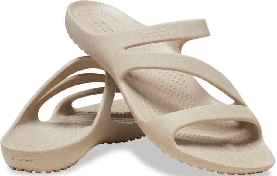 pair of beige crocs sandals